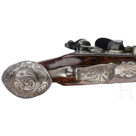 A fine pair of flintlock pistols from the armoury of the Duke of Bavaria, Charles Albert (1726-45), by Johann Gottfried Kolbe of Suhl, circa 1740