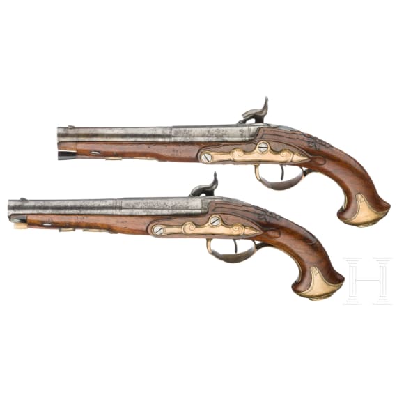 A pair of adapted percussion pistols, France, circa 1800