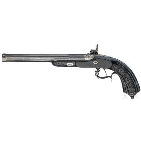 A French percussion flintlock pistol with ebony stock, circa 1840/50