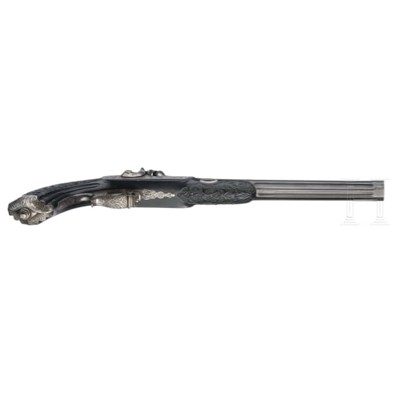 A French percussion flintlock pistol with ebony stock, circa 1840/50
