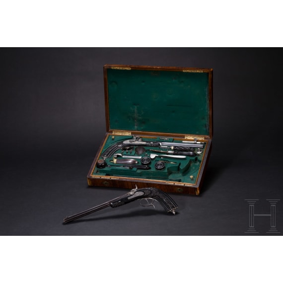 A cased pair of fine ebony stocked percussion pistols by Anton Krebs of Vienna, circa 1860