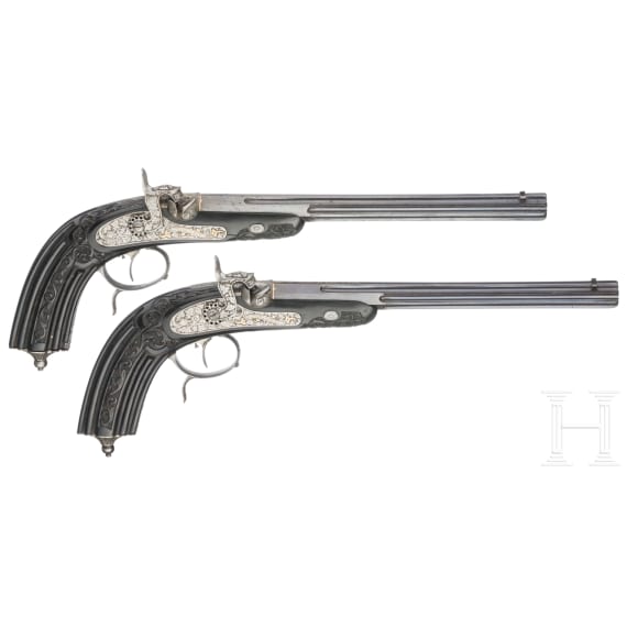 A cased pair of fine ebony stocked percussion pistols by Anton Krebs of Vienna, circa 1860