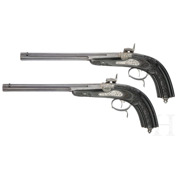 A cased pair of fine ebony stocked percussion pistols by Anton Krebs of Vienna, circa 1860