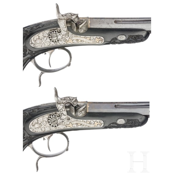 A cased pair of fine ebony stocked percussion pistols by Anton Krebs of Vienna, circa 1860