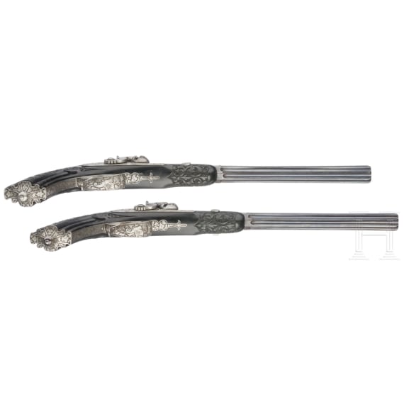 A cased pair of fine ebony stocked percussion pistols by Anton Krebs of Vienna, circa 1860