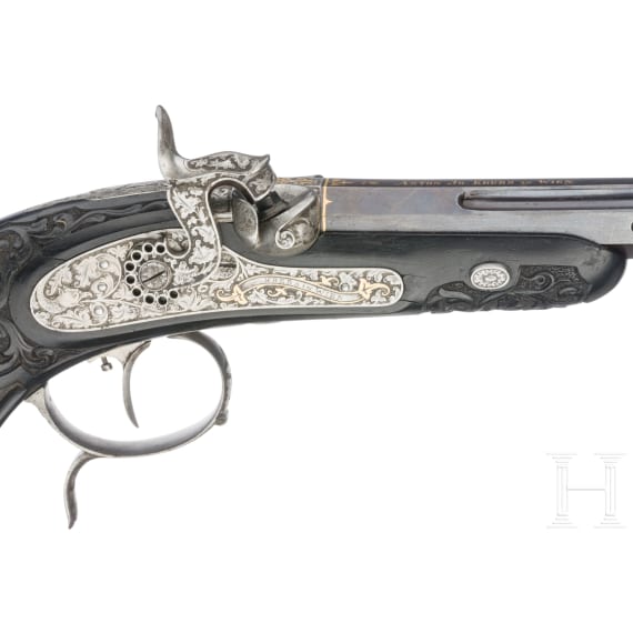 A cased pair of fine ebony stocked percussion pistols by Anton Krebs of Vienna, circa 1860