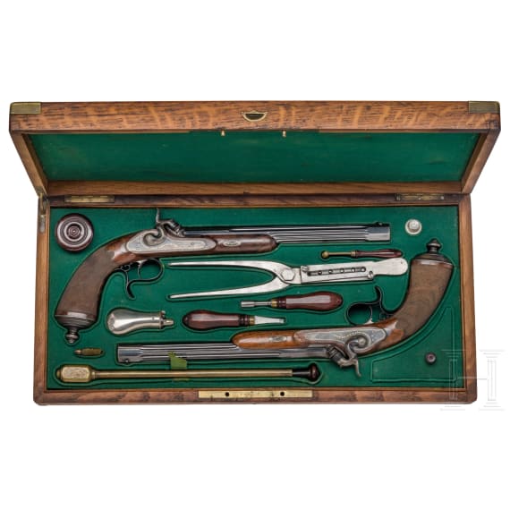 A pair of deluxe percussion pistols in a case, L. Collombert, Aix-les-Bains, circa 1850/60