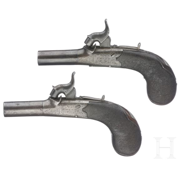 A pair of percussion pocket pistols in a box, Smith, Sheffield, circa 1850