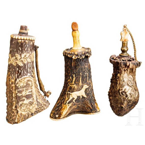 Three German powder flasks, 19th century