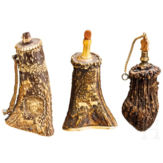 Three German powder flasks, 19th century