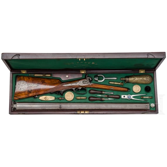 A cased side-by-side percussion combination shotgun by Lebeda of Prague