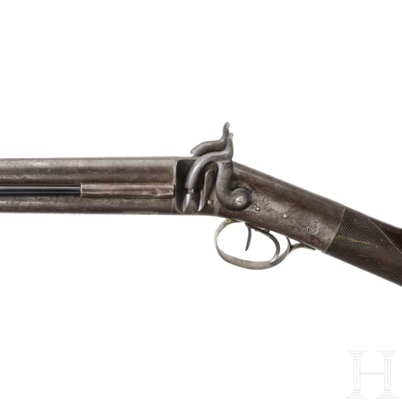 An over and under percussion rifle