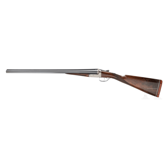 A cased side-by-side shotgun by Churchill, London