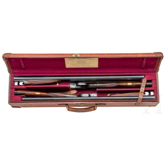 A pair of side-by-side shotguns by Stephen Grant & Sons, in case