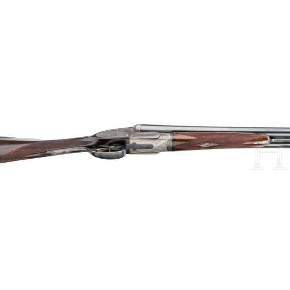 A pair of side-by-side shotguns by Stephen Grant & Sons, in case