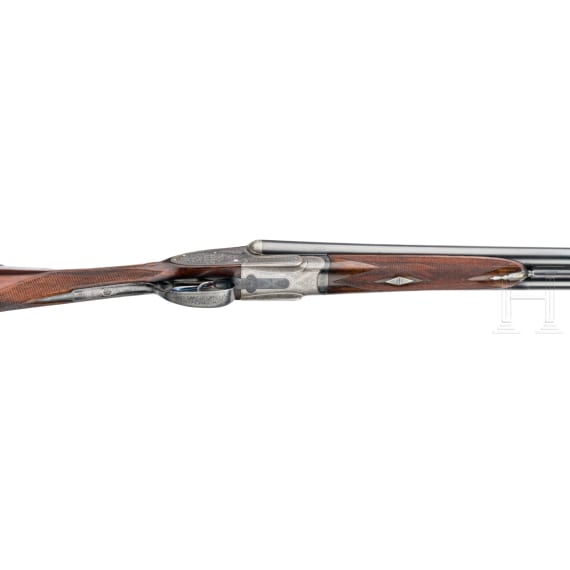 A pair of side-by-side shotguns by Stephen Grant & Sons, in case
