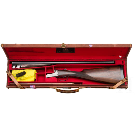 A cased side-by-side shotgun by Piotti, Gardone