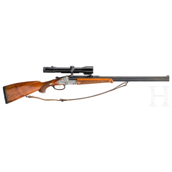 An over-and-under combination gun by Juch, Ferlach, with Zeiss scope
