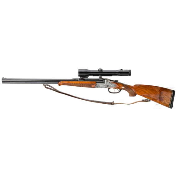 An over-and-under combination gun by Juch, Ferlach, with Zeiss scope