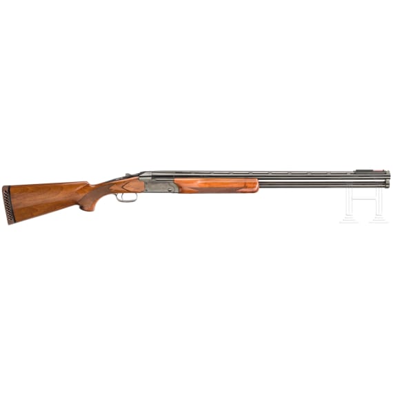 An over and under shotgun Remington Mod. 3200