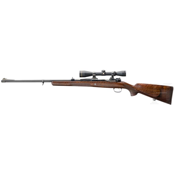 A repeating rifle system 98 with Leupold scope