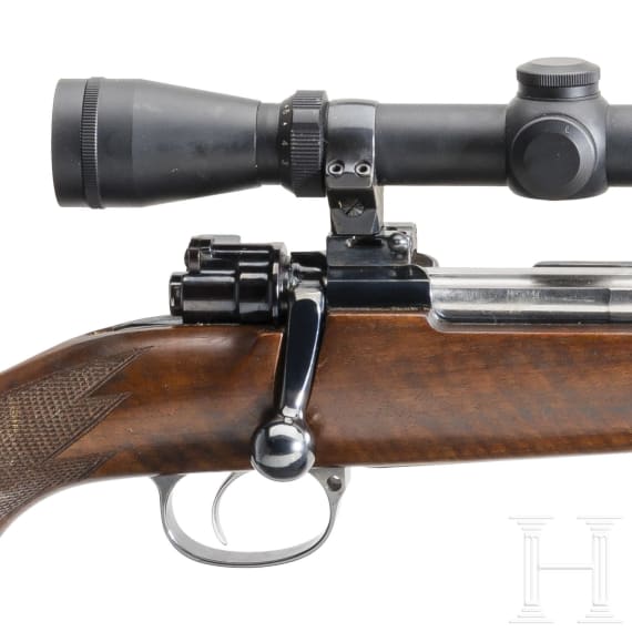 A repeating rifle system 98 with Leupold scope