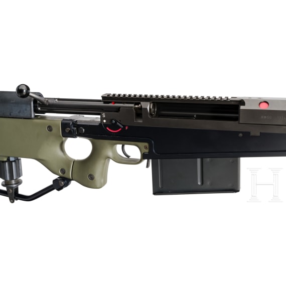 A repeating rifle Accuracy International, with Schmidt & Bender scope