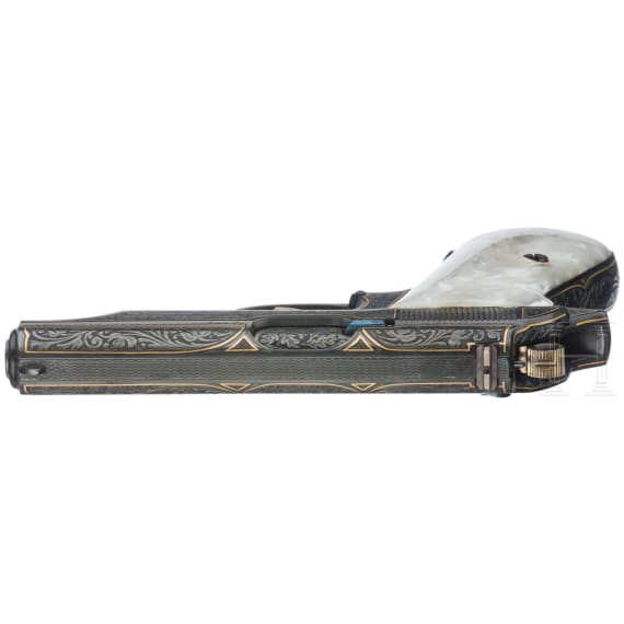A Walther PP, deeply engraved gold, in a luxury case