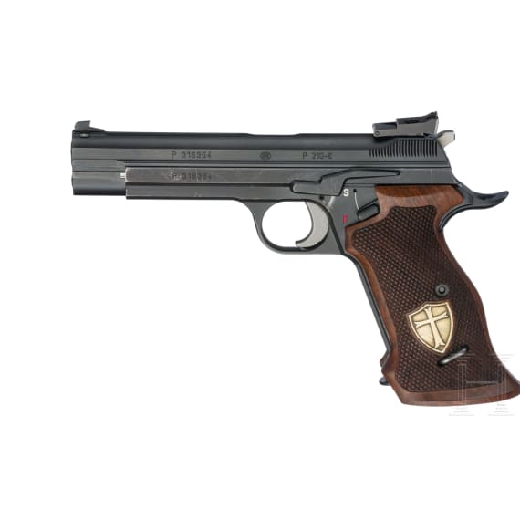 A SIG P210-6, with conversion kit