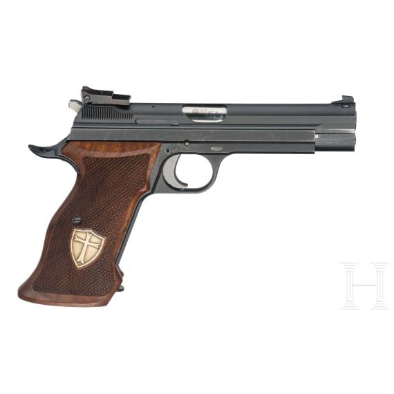 A SIG P210-6, with conversion kit