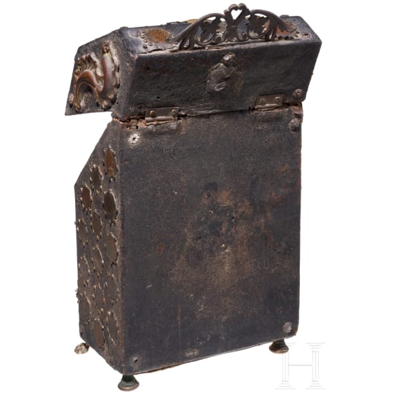 A copper and coin-mounted leather cutlery casket