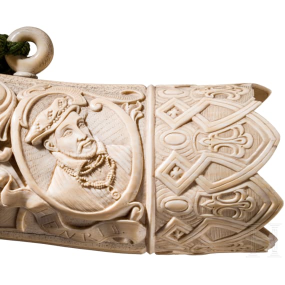 A large, finely carved German ivory olifant with portraits of the French kings Fran&ccedil;ois I and Henri II and a hunting scene, mid-19th century