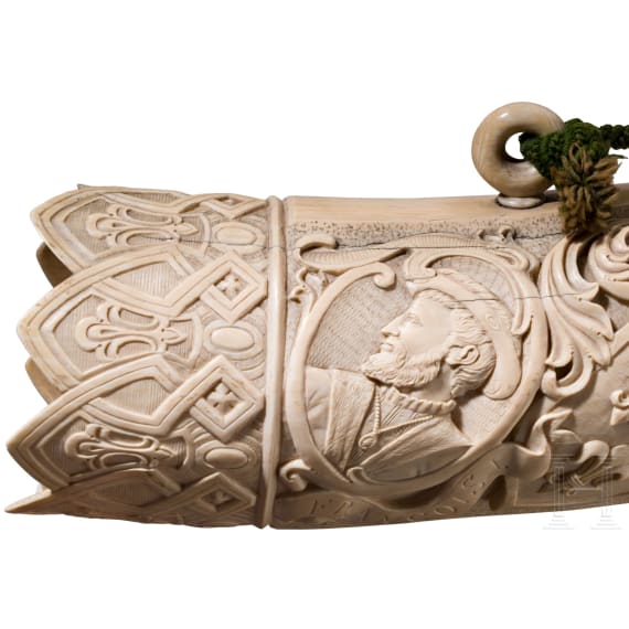 A large, finely carved German ivory olifant with portraits of the French kings Fran&ccedil;ois I and Henri II and a hunting scene, mid-19th century
