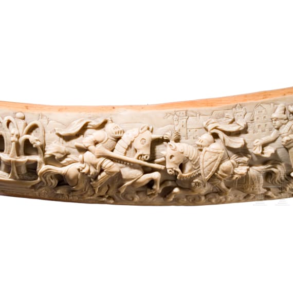 A large, finely carved German ivory olifant with portraits of the French kings Fran&ccedil;ois I and Henri II and a hunting scene, mid-19th century