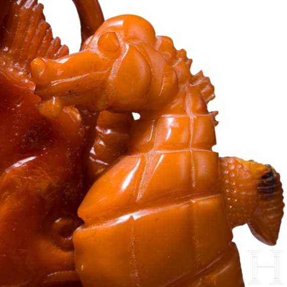 An amber carving with seahorse