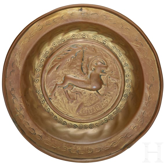 A small brass alms dish, Nuremberg, mid-16th century