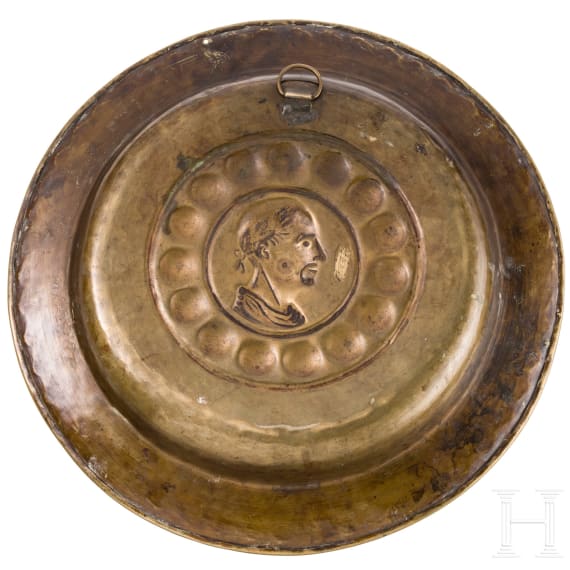 A Nuremberg brass alms dish with Cicero motive, 16th century