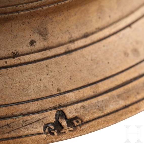 A bell-bottom candlestick with maker's mark, Nuremberg, circa 1700