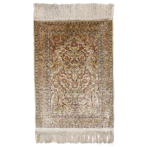 A small silk carpet, Persia, probably Ghom, 1950s/70s