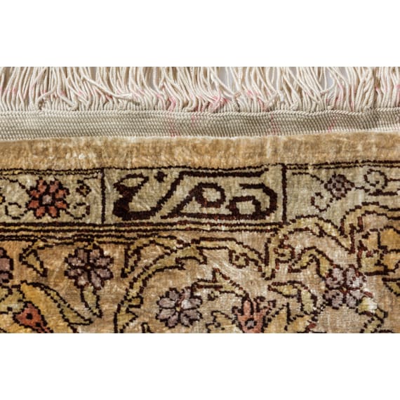 A small silk carpet, Persia, probably Ghom, 1950s/70s
