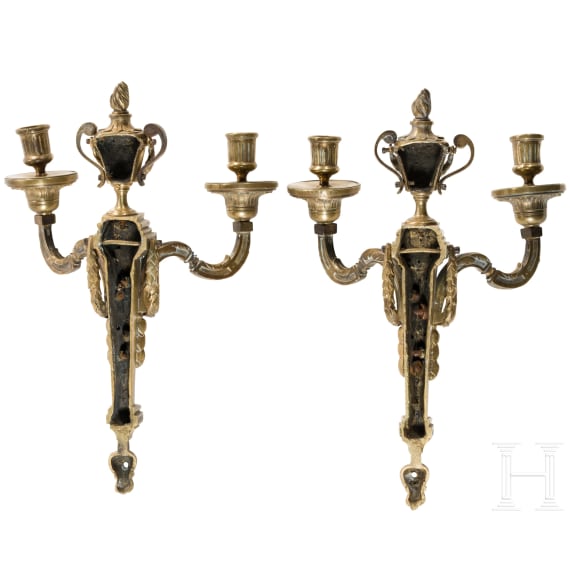 A pair of French fire-gilt appliqu&eacute;s in the style of Louis XVI, 19th century