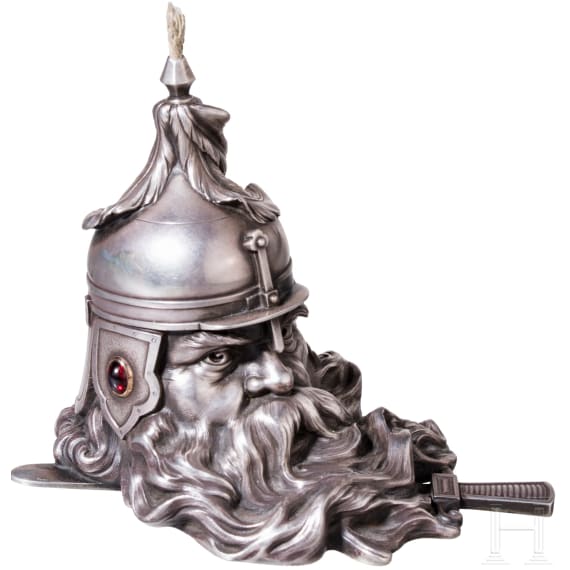 A silver table lighter in the form of a bogatyr&rsquo;s head in the manner of Faberg&eacute;, late 20th century