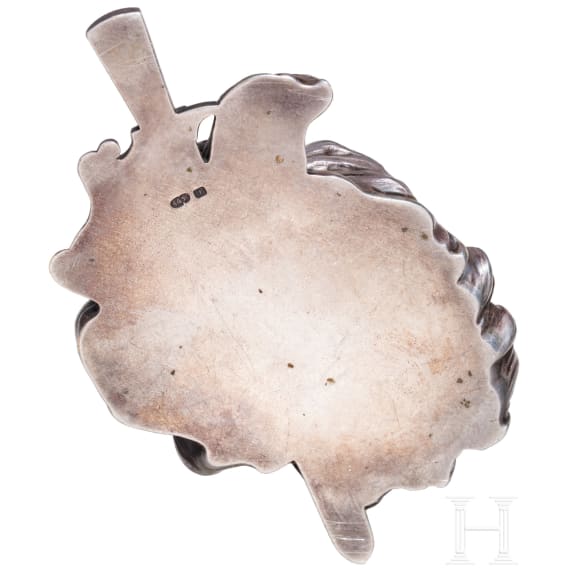 A silver table lighter in the form of a bogatyr&rsquo;s head in the manner of Faberg&eacute;, late 20th century