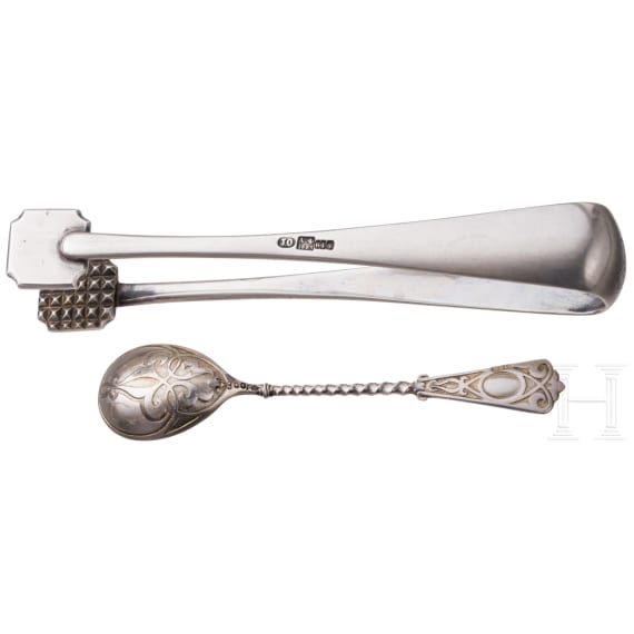 A pair of Russian silver sugar tongs and a tea spoon with troika, St. Petersburg. J. Olsonius for Gratchev, 1883 (sugar tongs) and circa 1900 (tea spoon)