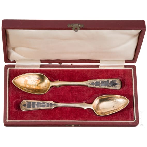 Two Russian silver-gilt and niello spoons with case, Moscow, 1835