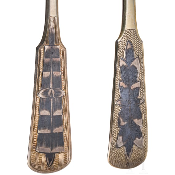 Two Russian silver-gilt and niello spoons with case, Moscow, 1835