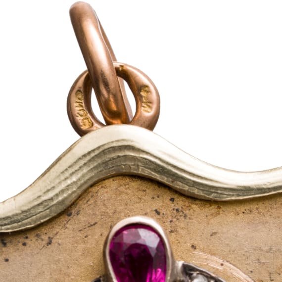 A Russian 18ct gold medallion set with ruby and diamonds