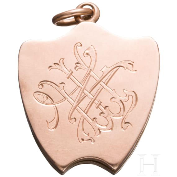 A Russian 18ct gold medallion set with ruby and diamonds