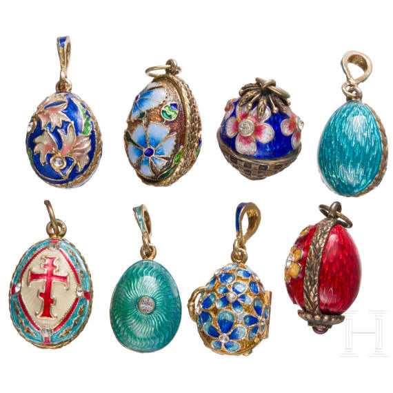 Eight Russian silver-gilt and enamelled egg-pendants, 20th century