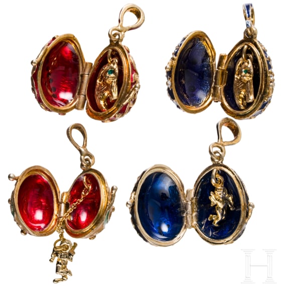 Five Russian silver-gilt and enamelled egg-pendants, 20th century